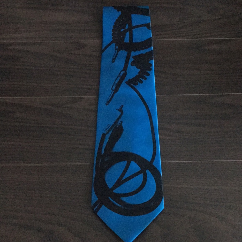 Blue tie with audio cables
